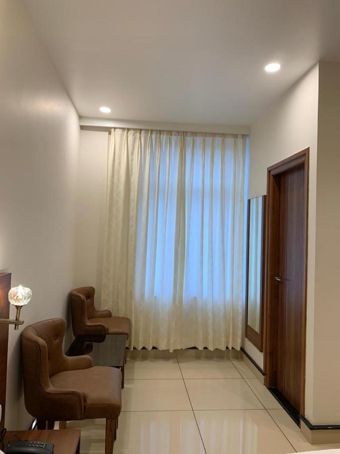 Jesta Residency Hotel Hassan Luaran gambar
